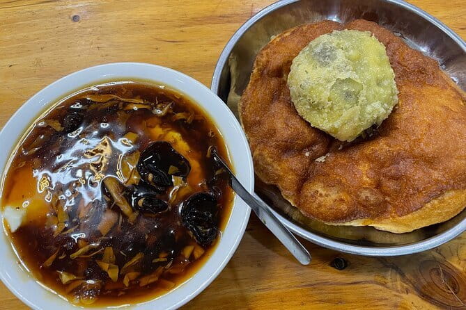 Beijing Hutong Breakfast & Coffee Tour - Sesame balls and wontons on Dengshikou Avenue