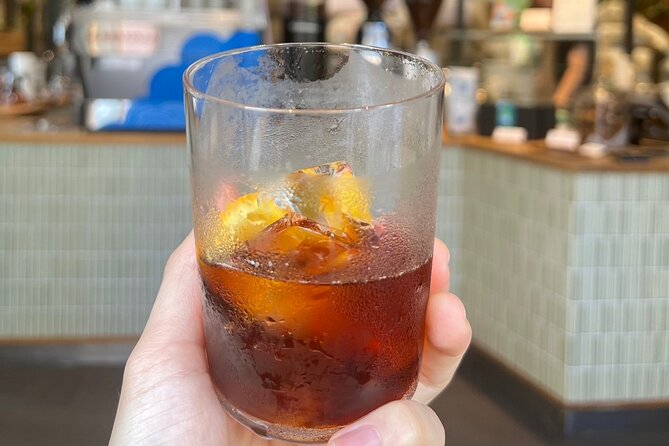 Best of Downtown Tokyo: Nature, Coffee, & Japanese Sweets Tasting - Japanese sweets near the Futatsume-dori monument