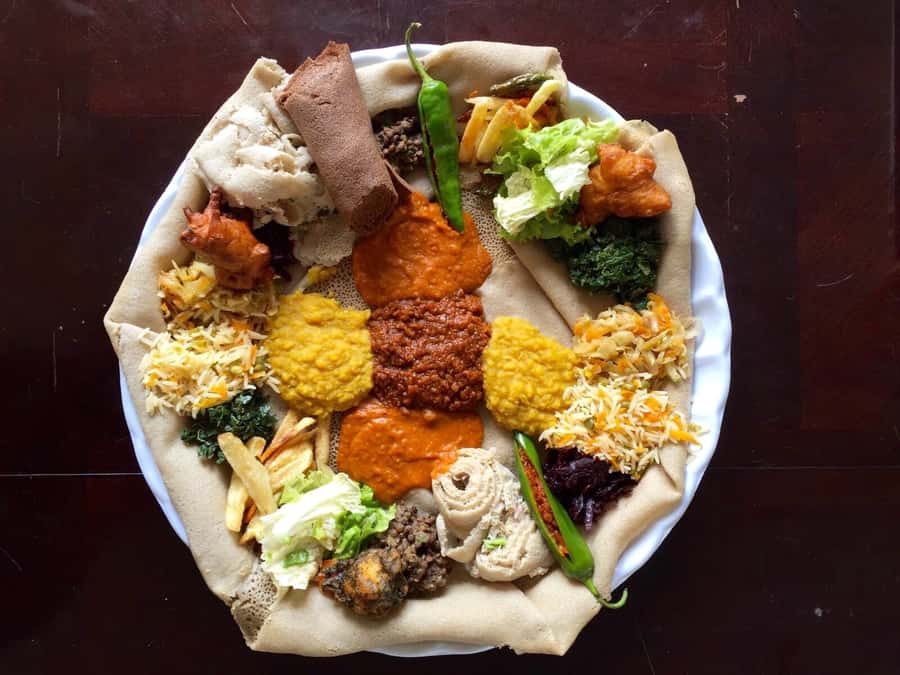 Ethiopian Culinary Tour - Market, Coffee Ceremony and More - Learning to bake spongy injera