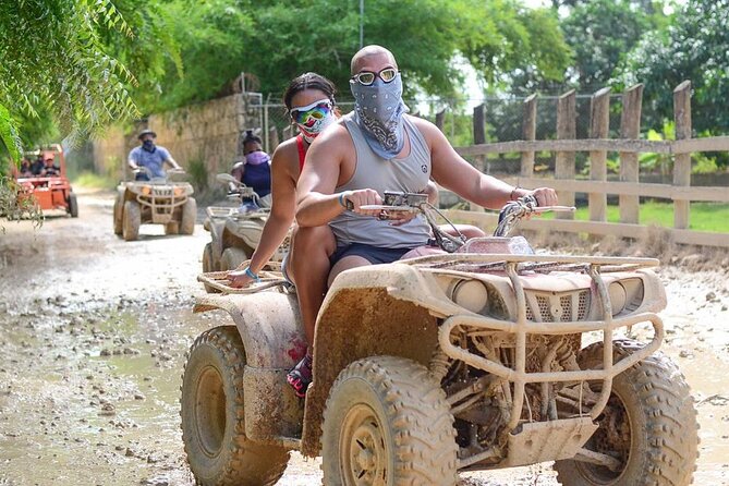 Full-Day Adventure with ATV, Party Boat, Snorkel & Coffee Tasting - Swimming in the blue water of Macao Cave