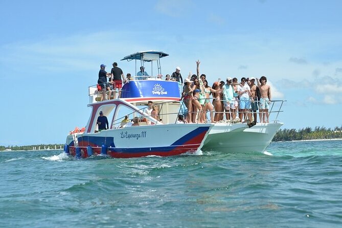 Full Day ATV, Coffee, Chocolate Tasting & Party Boat - Boarding the catamaran from Bavaro Beach