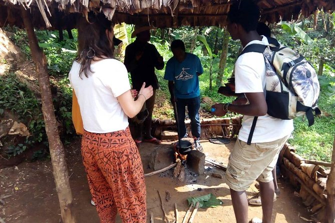 Materuni Waterfalls & Coffee making Cultural Tour | BURIGI CHATO SAFARIS LTD - A tall fall, cool water, and views toward Kibo
