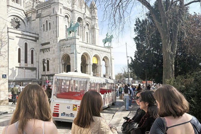 Montmartre & Sacré Coeur : Museum & Coffee In A Tiny Group Tour - Rue Lepic and the artists’ Montmartre