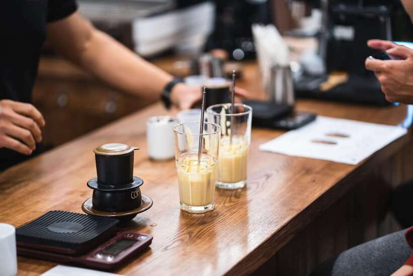 NYNA Coffee Culture- Egg Coffee/Salted Coffee/Coconut Coffee - Mixing cold coconut coffee in Hanoi