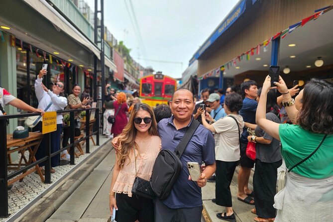 Private Floating Market, Train Market and After Rain Cafe Tour - Maeklong Railway Market: the train comes through the stalls