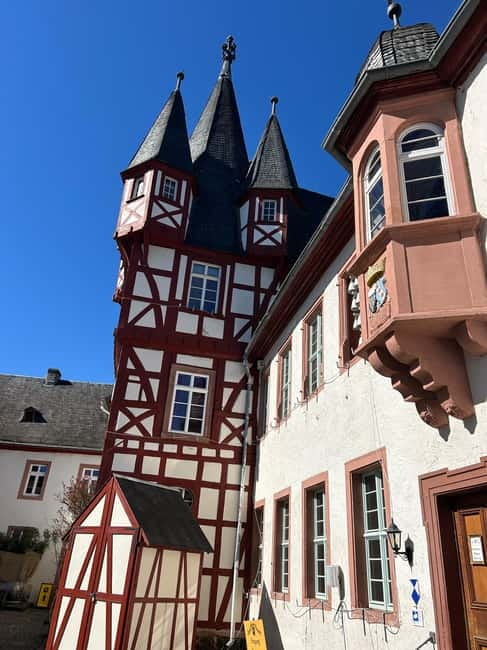 Rüdesheim: City tour with music, wine, and Rüdesheim coffee - The Music Cabinet’s old Admiral and violina