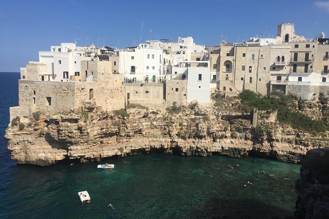 The Best of Polignano a Mare Walking Tour and Special Coffee Tasting - Seeing the caves, inlets, and sea-cut edges